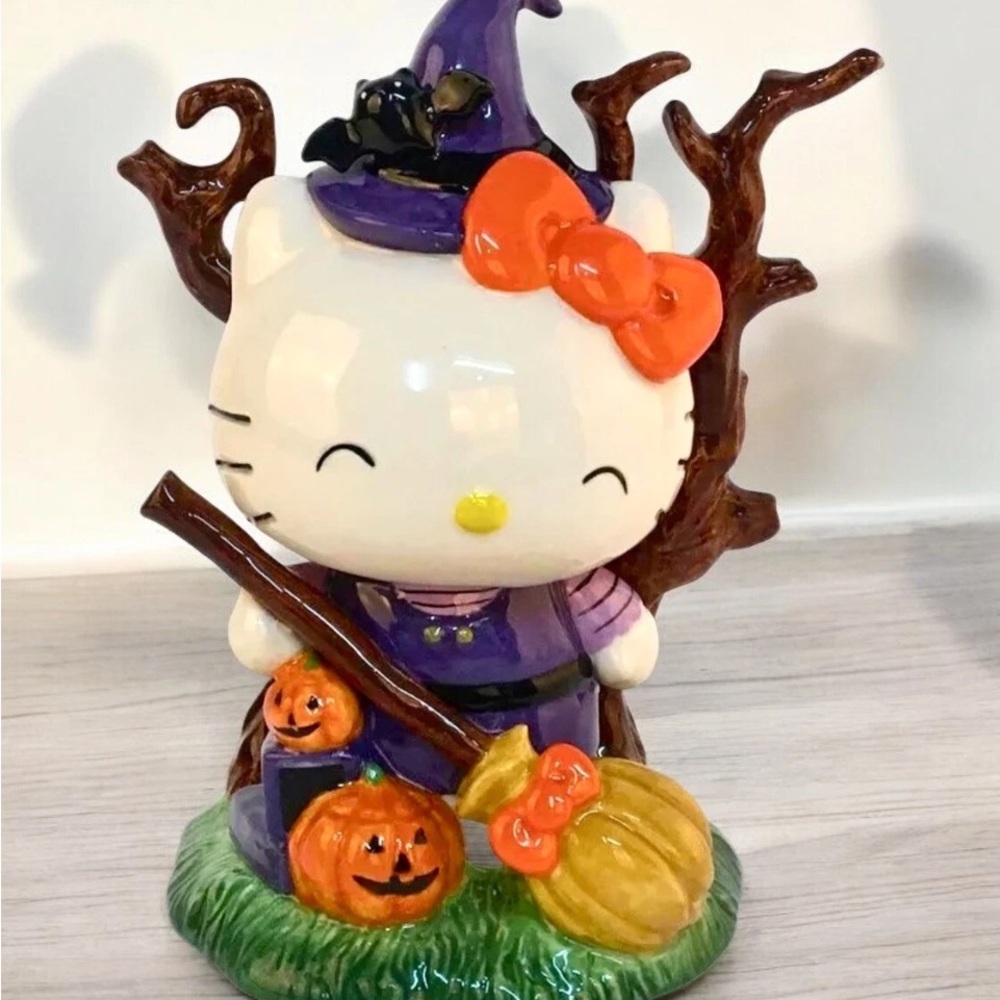 Halloween hello kitty Witch Figurine with Pumpkins blue sky